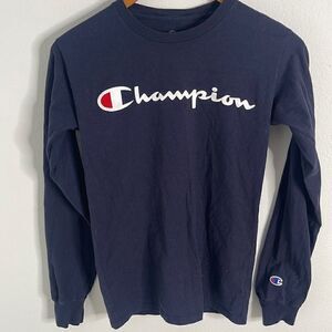 Champion long sleeve basic tee.  Embroidered emblem on sleeve.  Size XS.